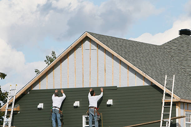 Professional Siding Replacement technician working in Jacobs Creek, PA